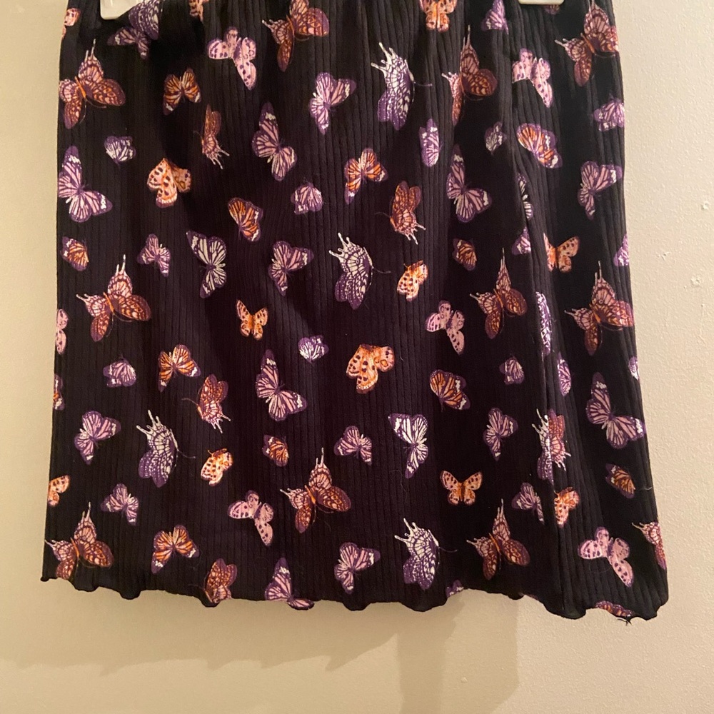 New with tags. Black and butterfly print mini skirt from Kohls.